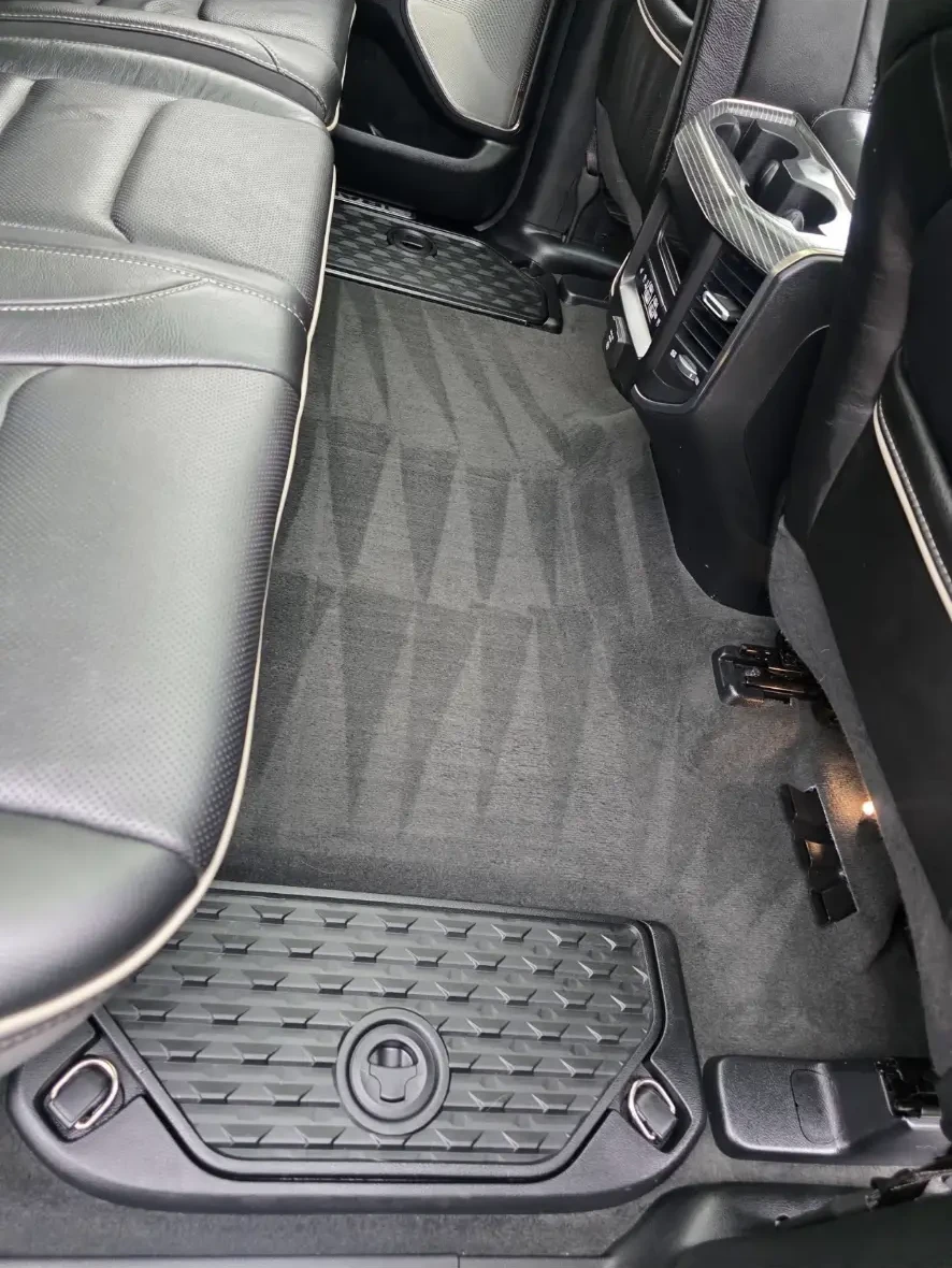 After: Ram rear cabin with clean carpet and wiped leather seats