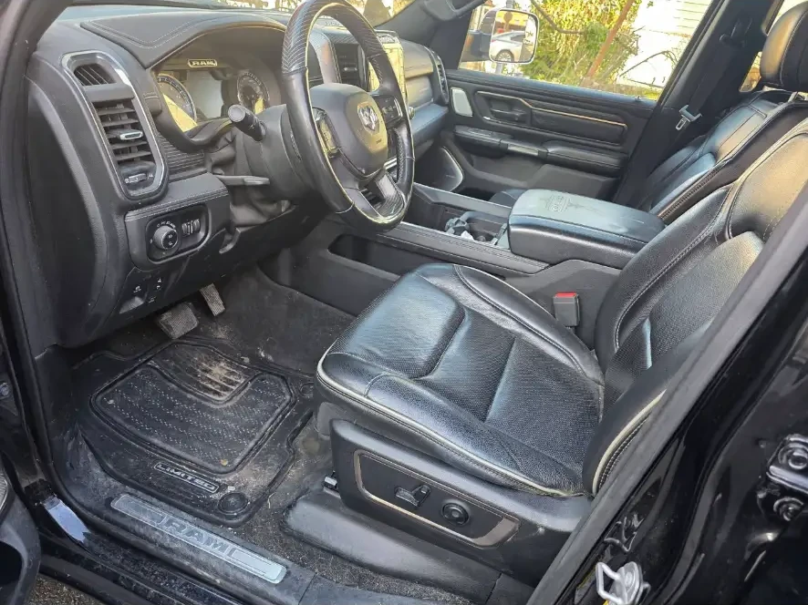 Before: Ram driver area with dirty floor mat and dusty sill